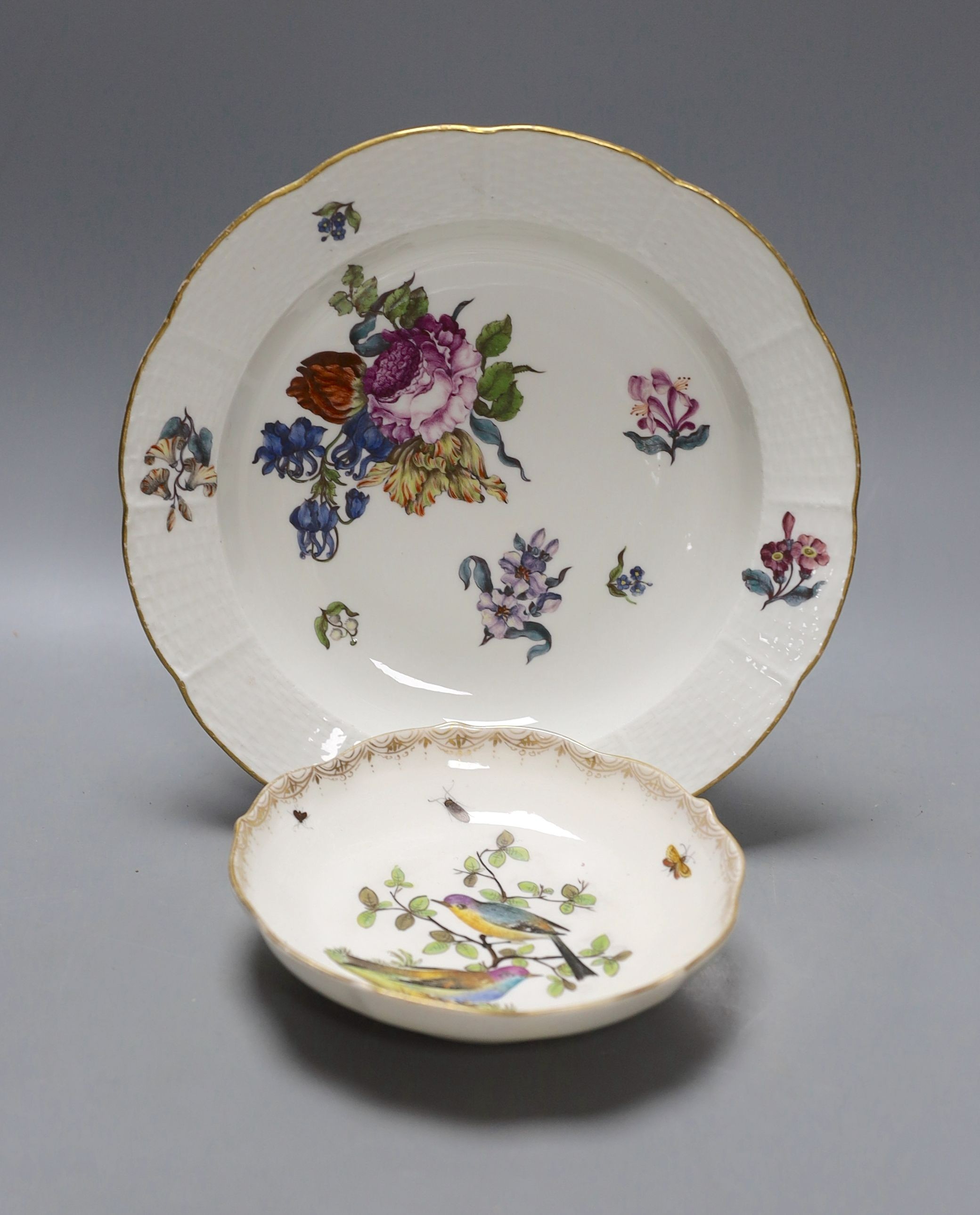 A Meissen Deutsche Blumen soup plate, c.1750 and a 19th-century Meissen outside decorated saucer (2)